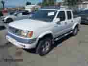 2000 Nissan Frontier XE with VIN 1N6ED27T5YC433357, listed as a IAAI auction lot 42405160 with 290,620 mi miles and . Bid and sale history available at DreamBid. Image 2.