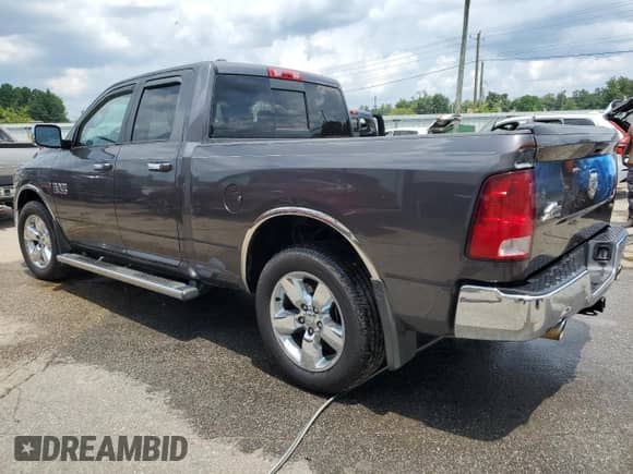 2014 Ram 1500 Big Horn with VIN 1C6RR7GM6ES317623, listed as a Copart auction lot 64665454 with 230,447 mi miles and Salvage title. Bid and sale history available at DreamBid. Image 2.
