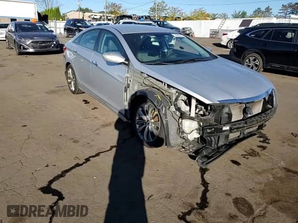 2012 Hyundai Sonata SE z VIN 5NPEC4AC5CH328230, wystawiony jako Copart lot #82292555 z przebiegiem 210 741 mil mil oraz Szkoda całkowita • Salvage title. Historia ofert i sprzedaży dostępna na DreamBid. Obrazek 13.