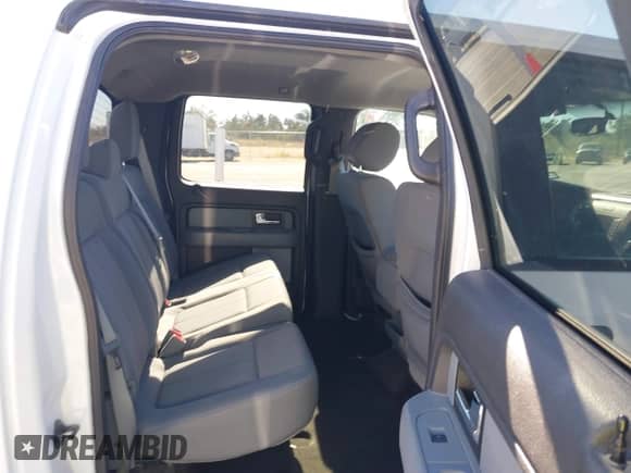 2013 Ford F-150 XL with VIN 1FTFW1CF6DKG07206, listed as a IAAI auction lot 40913265 with 89,125 mi miles and . Bid and sale history available at DreamBid. Image 8.