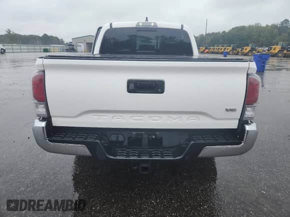 2021 Toyota Tacoma SR с VIN 5TFCZ5AN0MX271938, выставлен на аукционе Copart как лот 84353865 с пробегом 55 788 миль миль и Списание • Salvage title. История ставок и продаж доступна на DreamBid. Изображение 6.