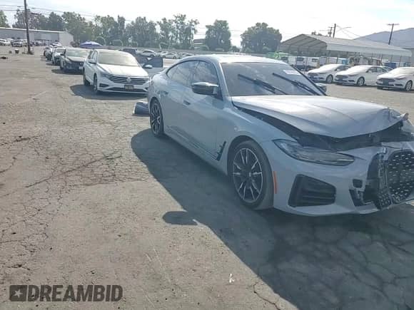 2022 BMW 4 Series M440i xDrive с VIN WBA13AW09NFM14758, выставлен на аукционе Copart как лот 70178975 с пробегом 53 137 миль миль и Списание • Salvage title. История ставок и продаж доступна на DreamBid. Изображение 13.