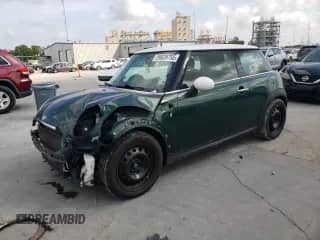 2012 MINI Hardtop with VIN WMWSU3C5XCT184918, listed as a Copart auction lot 59039755 with 126,185 mi miles and Salvage title. Bid and sale history available at DreamBid. Image 1.