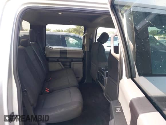 2018 Ford F-150 XL with VIN 1FTEW1CP8JKC70201, listed as a IAAI auction lot 42620912 with 124,499 mi miles and . Bid and sale history available at DreamBid. Image 8.