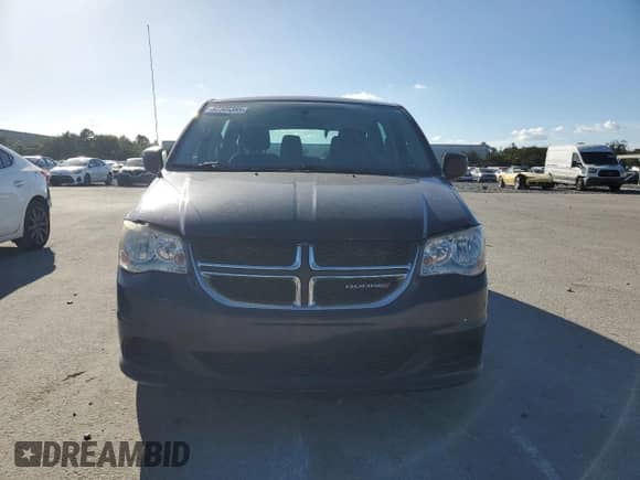 2016 Dodge Grand Caravan American Value with VIN 2C4RDGBG9GR227668, listed as a Copart auction lot 82305385 with 161,268 mi miles and Clean title. Bid and sale history available at DreamBid. Image 5.