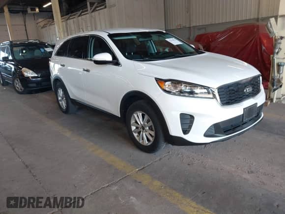 2019 Kia Sorento LX with VIN 5XYPG4A59KG561290, listed as a IAAI auction lot 42674023 with 78,091 mi miles and . Bid and sale history available at DreamBid. Image 1.