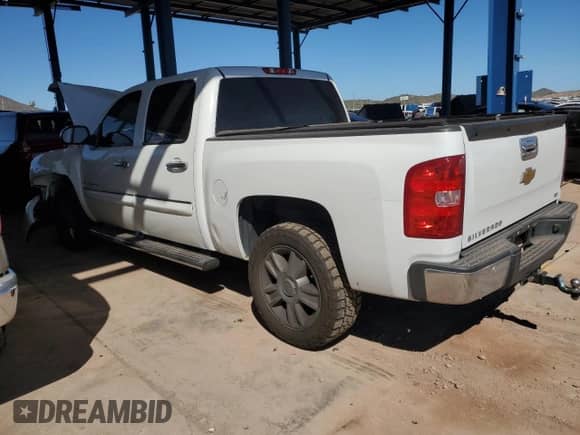 2013 Chevrolet Silverado 1500 LTZ with VIN 3GCPCTE09DG227608, listed as a Copart auction lot 84911185 with 136,123 mi miles and Salvage title. Bid and sale history available at DreamBid. Image 2.