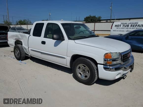 2003 GMC Sierra 1500 with VIN 2GTEC19V231322911, listed as a Copart auction lot 69864724 with 99,333 mi miles and Salvage title. Bid and sale history available at DreamBid. Image 4.