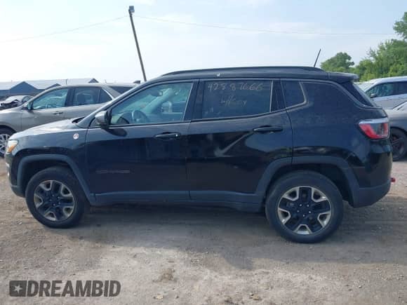 2018 Jeep Compass Trailhawk с VIN 3C4NJDDB0JT129673, выставлен на аукционе IAAI как лот 42887666 с пробегом 121 735 миль миль и . История ставок и продаж доступна на DreamBid. Изображение 14.
