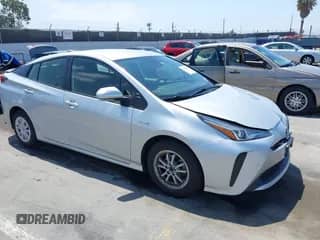 2021 Toyota Prius L Eco with VIN JTDKAMFU8M3150739, listed as a IAAI auction lot 42548652 with 118,303 mi miles and . Bid and sale history available at DreamBid. Image 1.
