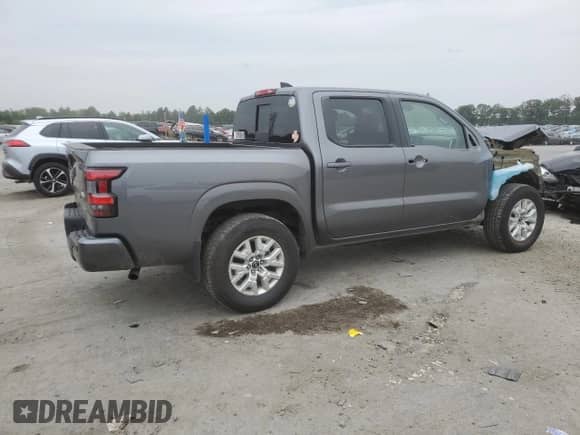 2023 Nissan Frontier Pro-4X with VIN 1N6ED1EK9PN621452, listed as a Copart auction lot 67550325 with 64,850 mi miles and Salvage title. Bid and sale history available at DreamBid. Image 3.