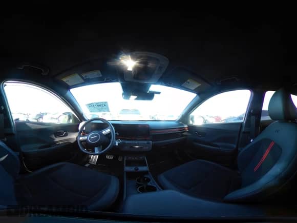 2025 Hyundai Kona N Line S z VIN KM8HBCA37SU232951, wystawiony jako IAAI lot #42907314 z przebiegiem 1 268 mil mil oraz . Historia ofert i sprzedaży dostępna na DreamBid. Obrazek 19.