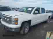 2015 Chevrolet Silverado 1500 LT with VIN 3GCUKREC7FG225541, listed as a IAAI auction lot 43169935 with 182,944 mi miles and . Bid and sale history available at DreamBid. Image 17.