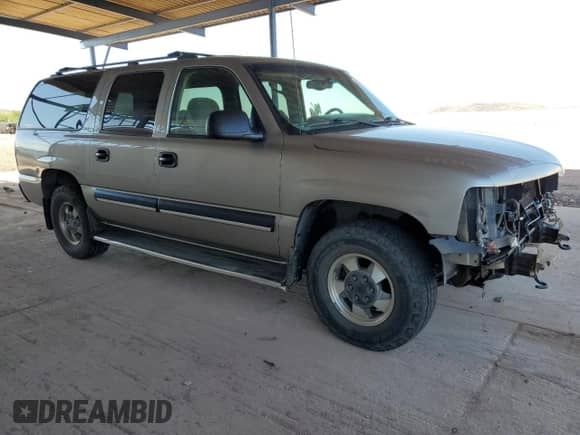 2001 Chevrolet Suburban LS z VIN 3GNFK16T31G214030, wystawiony jako Copart lot #80581095 z przebiegiem 159 386 mil mil oraz Szkoda całkowita • Salvage title. Historia ofert i sprzedaży dostępna na DreamBid. Obrazek 4.