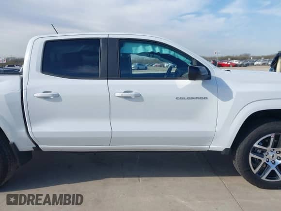 2023 Chevrolet Colorado 4WD Z71 with VIN 1GCPTDEK2P1246012, listed as a IAAI auction lot 41662137 with 14,612 mi miles and . Bid and sale history available at DreamBid. Image 14.