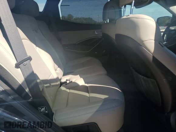 2017 Hyundai Santa Fe Ultimate z VIN 5XYZWDLA5HG492466, wystawiony jako Copart lot #84003215 z przebiegiem 153 187 mil mil oraz Szkoda całkowita • Salvage title. Historia ofert i sprzedaży dostępna na DreamBid. Obrazek 11.