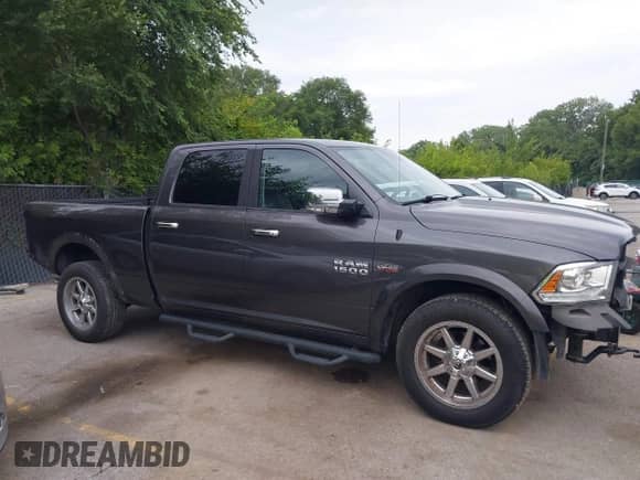 2015 Ram 1500 Laramie с VIN 1C6RR7VT0FS534421, выставлен на аукционе IAAI как лот 39895326 с пробегом 120 437 миль миль и . История ставок и продаж доступна на DreamBid. Изображение 14.