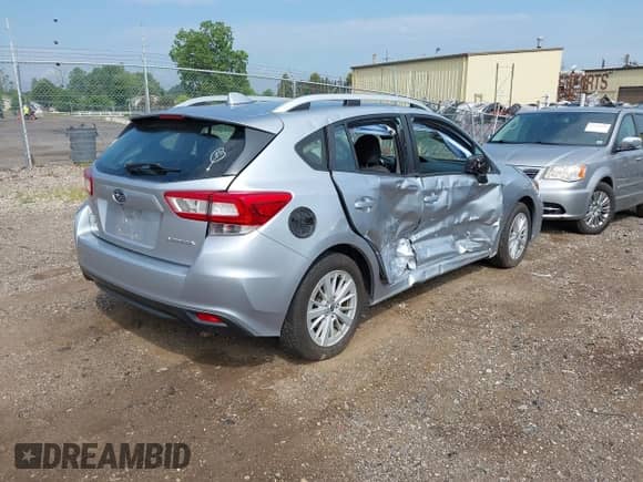 2018 Subaru Impreza Premium with VIN 4S3GTAB62J3708778, listed as a IAAI auction lot 42741555 with 105,430 mi miles and . Bid and sale history available at DreamBid. Image 4.