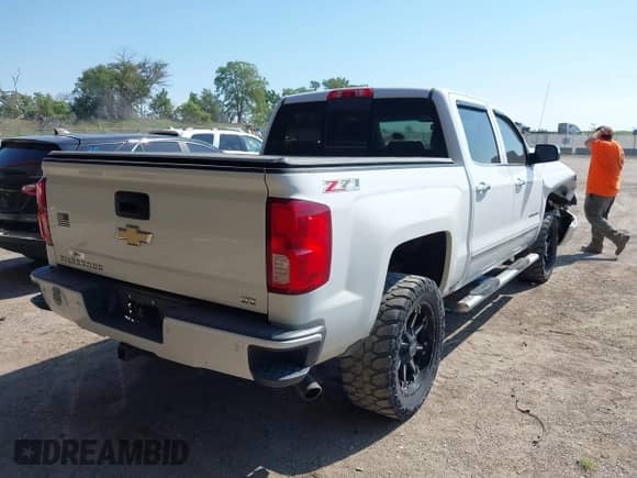 2016 Chevrolet Silverado 1500 LTZ with VIN 3GCUKSEC8GG246973, listed as a IAAI auction lot 42895392 with 139,767 mi miles and . Bid and sale history available at DreamBid. Image 4.