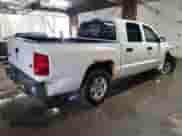 2006 Dodge Dakota SLT z VIN 1D7HE48N86S605611, wystawiony jako Copart lot #84433645 z przebiegiem 135 404 mil mil oraz Szkoda całkowita • Salvage title. Historia ofert i sprzedaży dostępna na DreamBid. Obrazek 3.