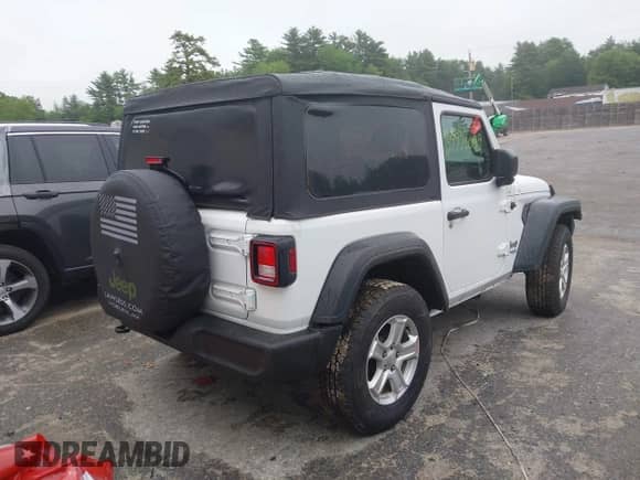 2019 Jeep Wrangler Sport S with VIN 1C4GJXAG0KW583315, listed as a IAAI auction lot 39990649 with 32,768 mi miles and . Bid and sale history available at DreamBid. Image 4.