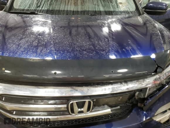 2018 Honda Pilot EX-L z VIN 5FNYF6H82JB010773, wystawiony jako Copart lot #43310725 z przebiegiem 128 874 mil mil oraz Szkoda całkowita • Salvage title. Historia ofert i sprzedaży dostępna na DreamBid. Obrazek 13.