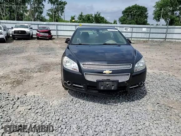 2010 Chevrolet Malibu LTZ with VIN 1G1ZE5E00AF136036, listed as a Copart auction lot 65701985 with 227,332 mi miles and Salvage title. Bid and sale history available at DreamBid. Image 13.