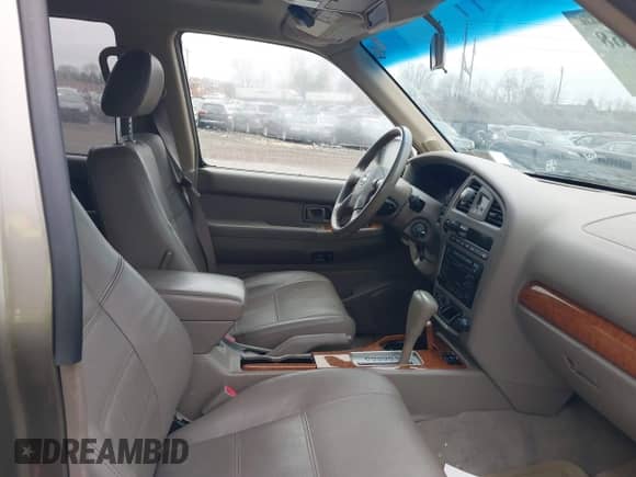 2003 Nissan Pathfinder SE z VIN JN8DR09Y33W831272, wystawiony jako IAAI lot #41437268 z przebiegiem 161 868 mil mil oraz . Historia ofert i sprzedaży dostępna na DreamBid. Obrazek 5.