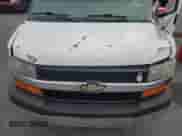 2012 Chevrolet Express Passenger 1LT с VIN 1GAZG1FG9C1143775, выставлен на аукционе Copart как лот 58383685 с пробегом Не указан миль и Списание • Salvage title. История ставок и продаж доступна на DreamBid. Изображение 12.