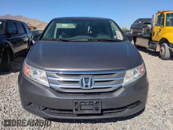 2013 Honda Odyssey EX-L with VIN 5FNRL5H61DB027011, listed as a Copart auction lot 69470375 with 123,161 mi miles and Salvage title. Bid and sale history available at DreamBid. Image 5.