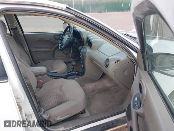 2005 Pontiac Grand Am SE with VIN 1G2NE52E95M233330, listed as a IAAI auction lot 43205427 with 154,019 mi miles and . Bid and sale history available at DreamBid. Image 5.