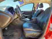 2012 Ford Focus Titanium z VIN 1FAHP3N22CL297534, wystawiony jako Copart lot #63643125 z przebiegiem 180 383 mil mil oraz Czysty tytuł • Clean title. Historia ofert i sprzedaży dostępna na DreamBid. Obrazek 7.