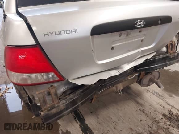 2000 Hyundai Accent z VIN KMHCF35G6YU016772, wystawiony jako IAAI lot #41067014 z przebiegiem 221 560 mil mil oraz . Historia ofert i sprzedaży dostępna na DreamBid. Obrazek 22.