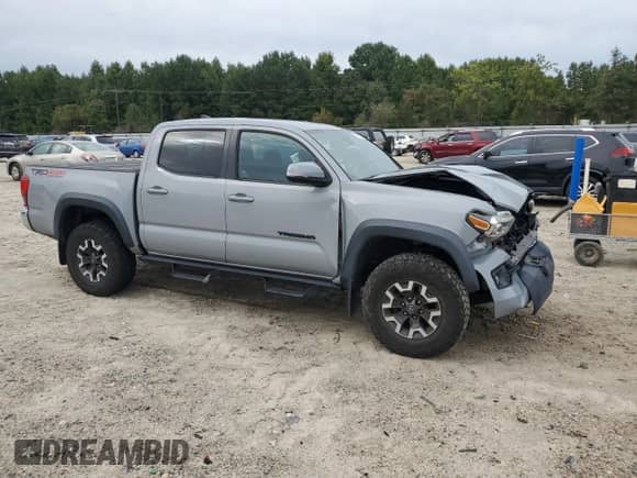 2019 Toyota Tacoma TRD Off Road z VIN 3TMCZ5ANXKM213550, wystawiony jako Copart lot #81675915 z przebiegiem 78 339 mil mil oraz Szkoda całkowita • Salvage title. Historia ofert i sprzedaży dostępna na DreamBid. Obrazek 4.