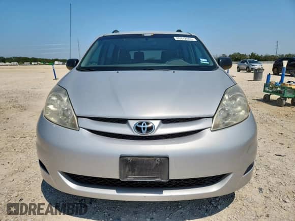 2007 Toyota Sienna LE z VIN 5TDZK23C97S014652, wystawiony jako Copart lot #80412095 z przebiegiem 115 800 mil mil oraz Szkoda całkowita • Salvage title. Historia ofert i sprzedaży dostępna na DreamBid. Obrazek 5.