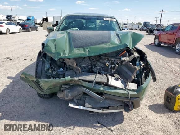 2023 Nissan Frontier Pro-4X with VIN 1N6ED1EK0PN670488, listed as a Copart auction lot 64129775 with 15,294 mi miles and Salvage title. Bid and sale history available at DreamBid. Image 5.