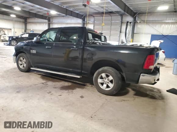 2013 Ram 1500 Tradesman with VIN 1C6RR6KG9DS538854, listed as a Copart auction lot 63003105 with 128,465 mi miles and Salvage title. Bid and sale history available at DreamBid. Image 2.