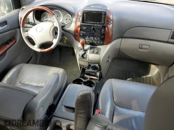 2005 Toyota Sienna XLE z VIN 5TDBA22CX5S051132, wystawiony jako Copart lot #84712135 z przebiegiem 179 807 mil mil oraz Szkoda całkowita • Salvage title. Historia ofert i sprzedaży dostępna na DreamBid. Obrazek 8.