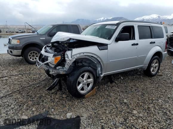 2010 Dodge Nitro SXT with VIN 1D4PT5GK3AW131922, listed as a Copart auction lot 51238695 with 158,434 mi miles and Salvage title. Bid and sale history available at DreamBid. Image 1.