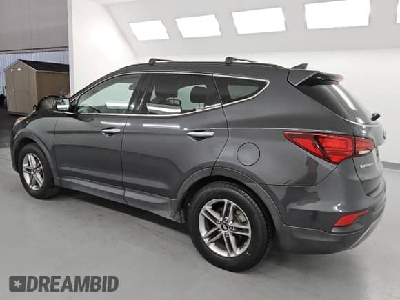 2017 Hyundai Santa Fe 2.4L с VIN 5XYZU3LB1HG414467, выставлен на аукционе Copart как лот 69486185 с пробегом 110 755 миль миль и Чистый • Clean title. История ставок и продаж доступна на DreamBid. Изображение 2.