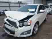 2014 Chevrolet Sonic LTZ with VIN 1G1JE5SB5E4122735, listed as a IAAI auction lot 42327595 with 163,912 mi miles and . Bid and sale history available at DreamBid. Image 2.