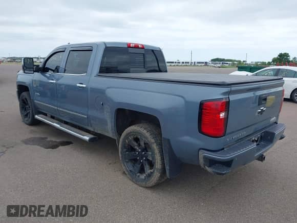 2016 Chevrolet Silverado 1500 High Country z VIN 3GCUKTEC2GG235957, wystawiony jako IAAI lot #42532113 z przebiegiem 116 193 mil mil oraz . Historia ofert i sprzedaży dostępna na DreamBid. Obrazek 3.
