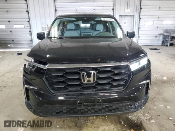 2023 Honda Pilot LX с VIN 5FNYG1H29PB026182, выставлен на аукционе Copart как лот 52125065 с пробегом 31 023 миль миль и Списание • Salvage title. История ставок и продаж доступна на DreamBid. Изображение 5.