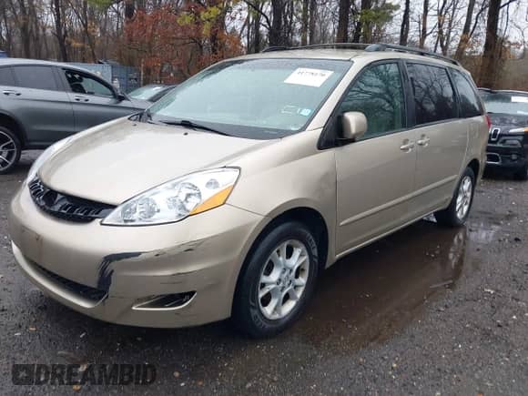 2006 Toyota Sienna XLE with VIN 5TDZA22C66S537484, listed as a IAAI auction lot 41778170 with 209,579 mi miles and . Bid and sale history available at DreamBid. Image 6.