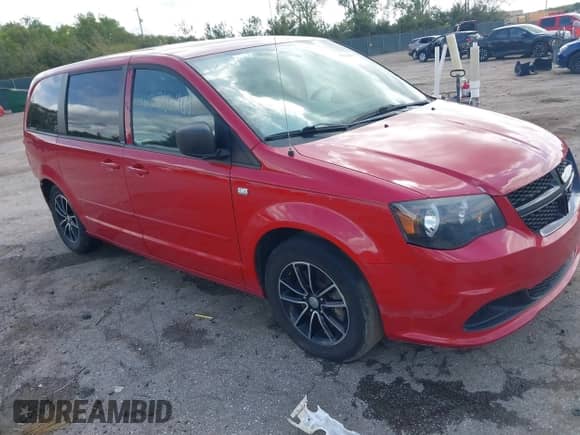 2014 Dodge Grand Caravan American Value with VIN 2C4RDGBG1ER279244, listed as a IAAI auction lot 42316467 with 190,493 mi miles and . Bid and sale history available at DreamBid. Image 1.