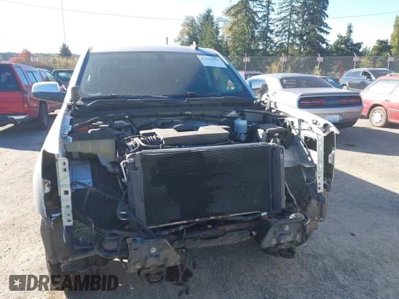 2016 Chevrolet Silverado 1500 LT with VIN 1GCVKREC8GZ229426, listed as a IAAI auction lot 43449954 with 104,294 mi miles and . Bid and sale history available at DreamBid. Image 13.