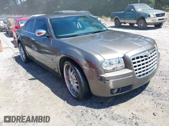 2010 Chrysler 300 Touring with VIN 2C3CA5CVXAH201307, listed as a IAAI auction lot 43079325 with 231,620 mi miles and . Bid and sale history available at DreamBid. Image 1.