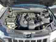 2013 Jeep Grand Cherokee Limited z VIN 1C4RJFBG7DC648943, wystawiony jako Copart lot #85731515 z przebiegiem 200 146 mil mil oraz Szkoda całkowita • Salvage title. Historia ofert i sprzedaży dostępna na DreamBid. Obrazek 12.