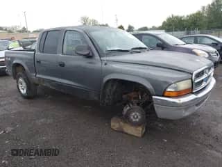 2003 Dodge Dakota SLT с VIN 1D7HG48N13S106123, выставлен на аукционе IAAI как лот 43290282 с пробегом 125 763 миль миль и . История ставок и продаж доступна на DreamBid. Изображение 1.