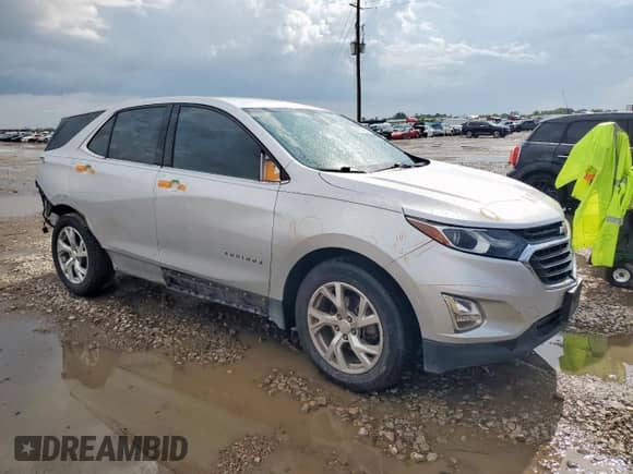 2020 Chevrolet Equinox LT с VIN 3GNAXKEV3LS573477, выставлен на аукционе Copart как лот 81815935 с пробегом 84 620 миль миль и Списание • Salvage title. История ставок и продаж доступна на DreamBid. Изображение 4.